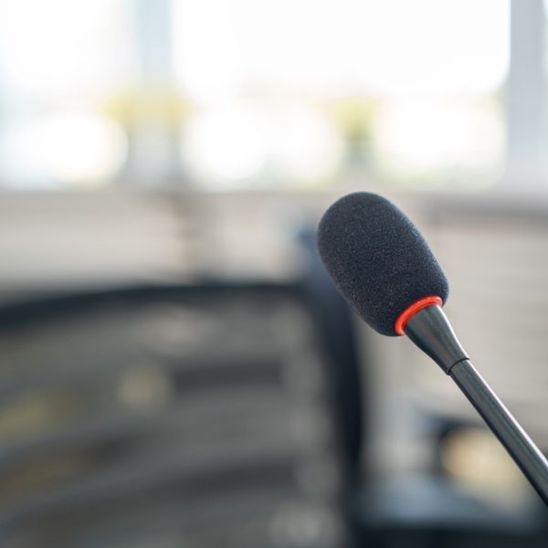 Close-up,Of,A,Black,Gooseneck,Microphone,With,Red,Accent,In